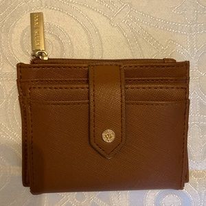 EUC Anne Klein wallet, clean, zipper & snap work. Small cracks in fold as shown.